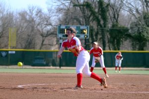 Wellington pitcher Heidi Gulick throws a pitch in the opening game against the El Dorado Wildcats